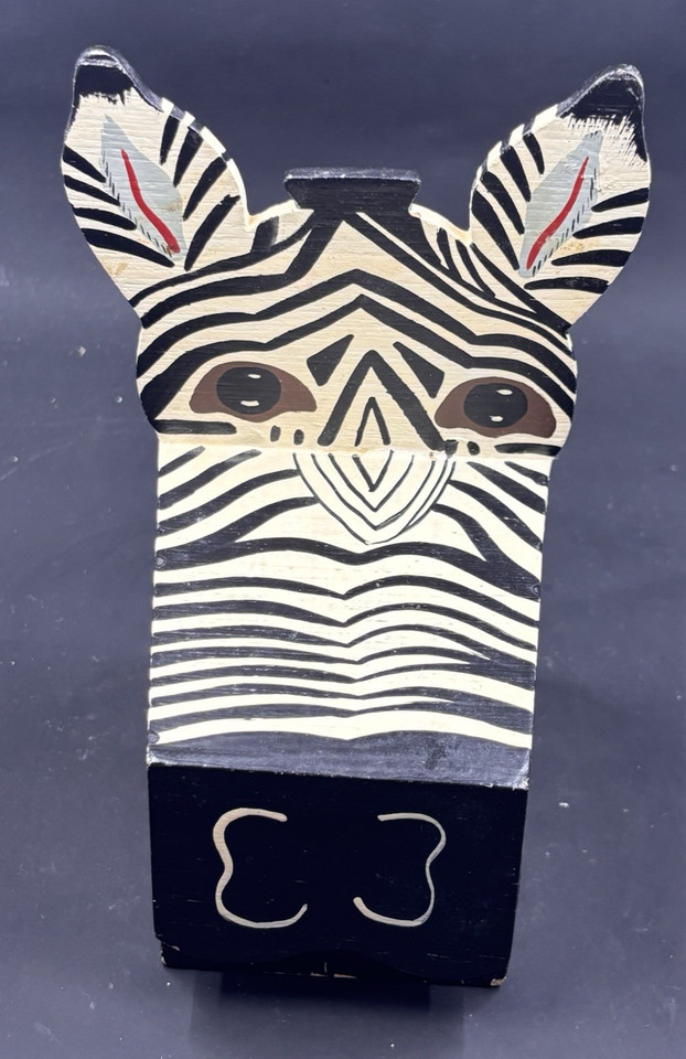 A hand-painted vintage zebra-head trinket box that lands perfectly in the sweet spot between whimsical art object and absurd desk centerpiece.