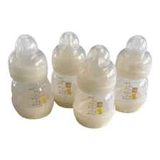 Lot of 4 MAM Easy Start Anti Colic 4 oz  Bottles w Nipples & Covers