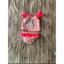 Girls size 6 to 9 months pink two piece bathing suit with unicorn