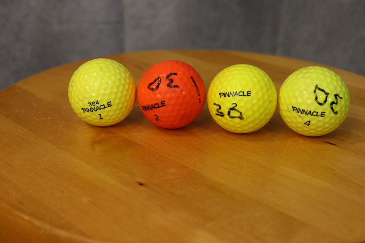 Pinnacle Golf Balls Yellow Orange #1, #2, #2, #4 Lot Of