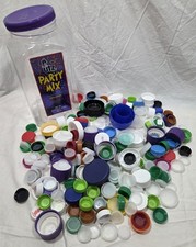Assorted Plastic Lids And Caps In 26 Ounce Plastic Canister