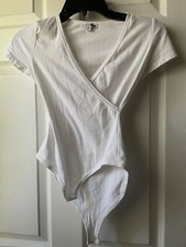 white fashion nova bodysuit