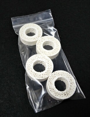 TWO PAIR OF 1.60  OD x 0.725  ID x 0.500  T.   ZIRCONIA FLOW THRU WASHER No.: 70