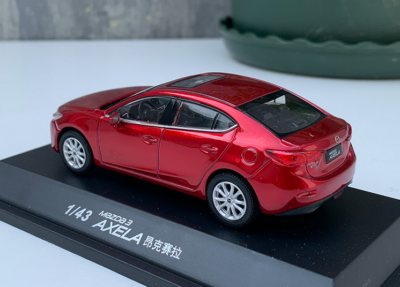 1/43 Reseller version alloy diecast car model 3 AXELA interstellar