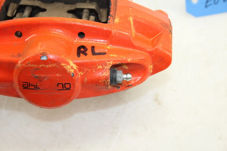 Pinza de freno deportiva trasera izquierda Nissan 370z 2010-2020 deportiva Akebono OEM EO64 Foto 2 de 4