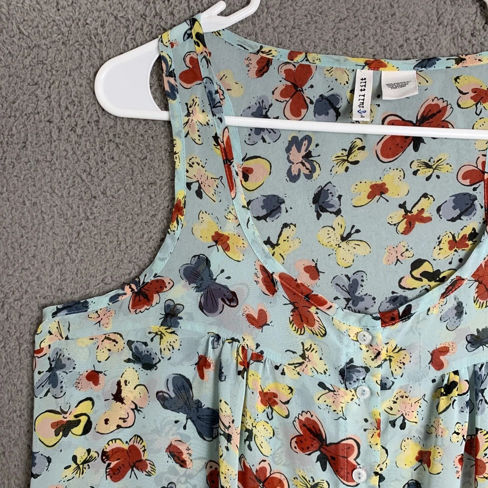 Blusa Top informal con botones cuello redondo sin mangas azul inclinable completo para mujer Foto 2 de 4