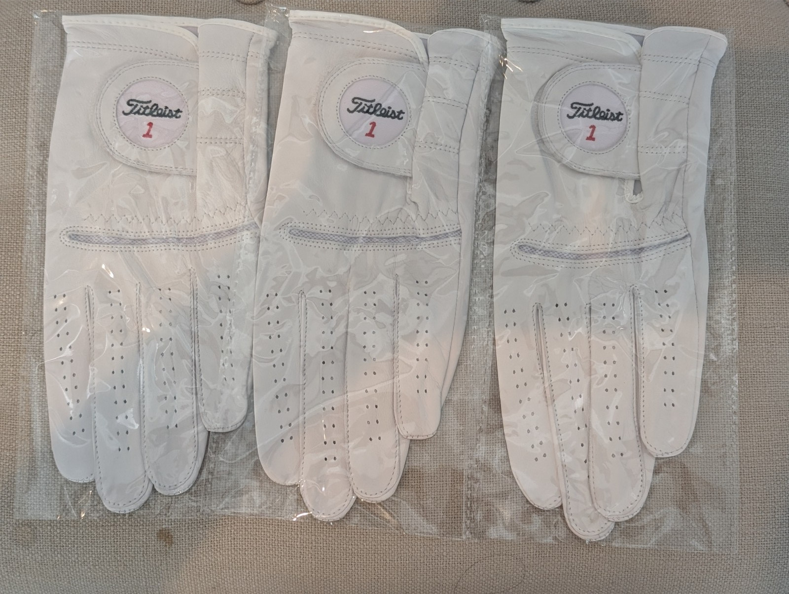 Titleist Perma factory second Soft Gloves Qty: 3 Medium-Large for RH golfer