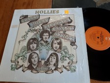 Hollies/Clarke,Hicks,Sylvester,Calvert,Elliot: 1977 Epic LP textured SHRINK Ex