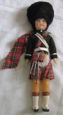 Antique Vintage celluloid Doll sleepy eyes Scottish guard High fur hat  bagpipe