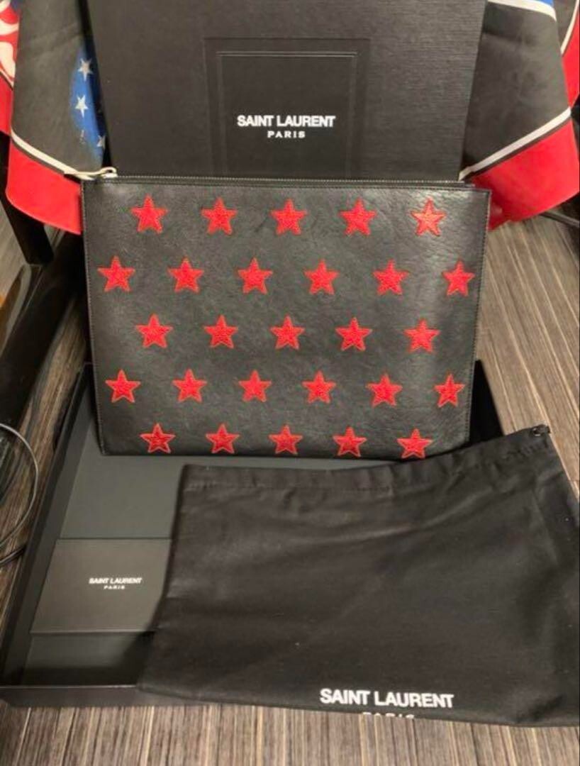 Borsa pochette Saint Laurent pelle nera x rossa modello stella uomo dal Giappone