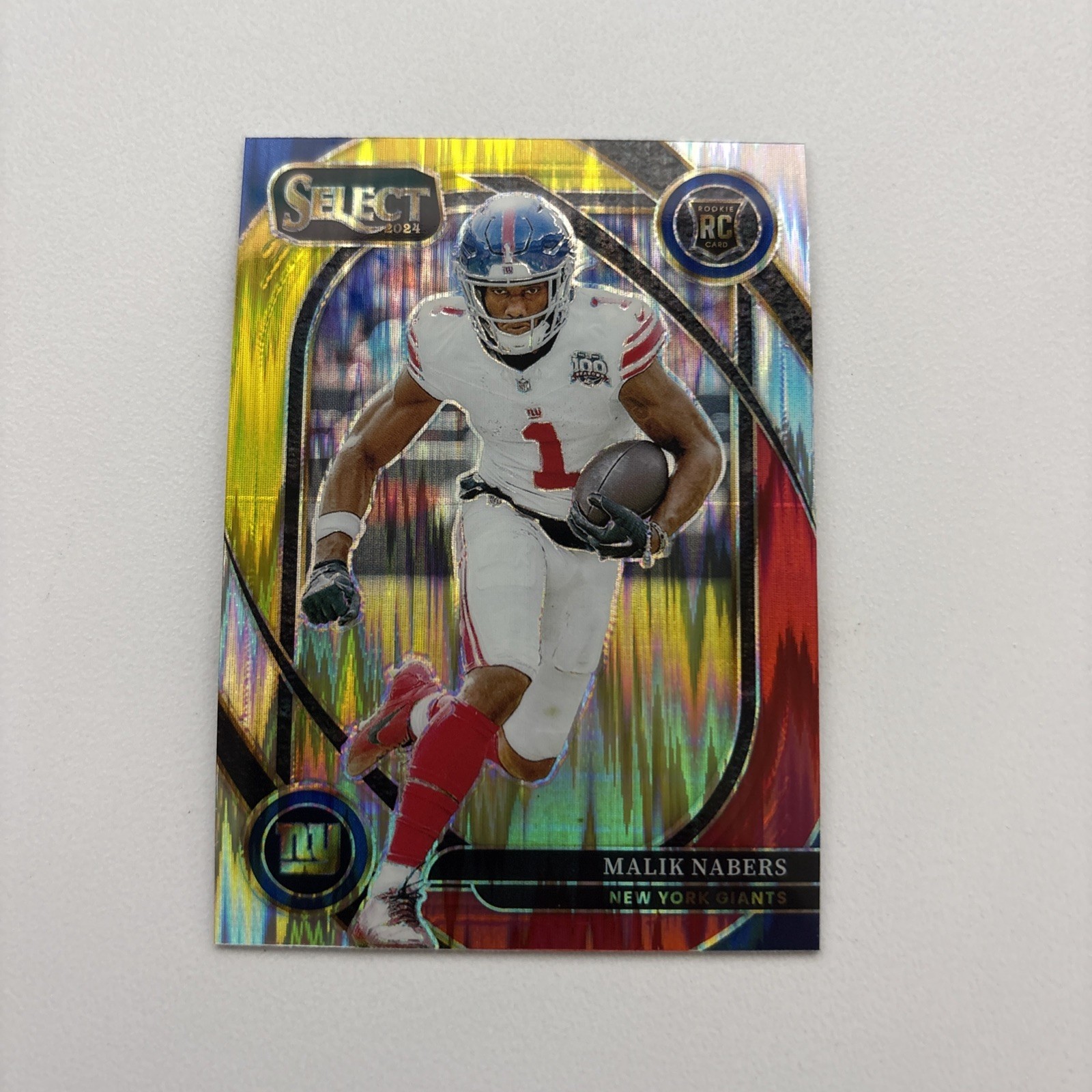 2024 Panini Select - Club Level Malik Nabers #220 Red & Yellow Shock Prizm (RC)