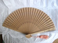 Carved Wooden Tan Folding Hand Fan with pink tassels 15" x 9" open
