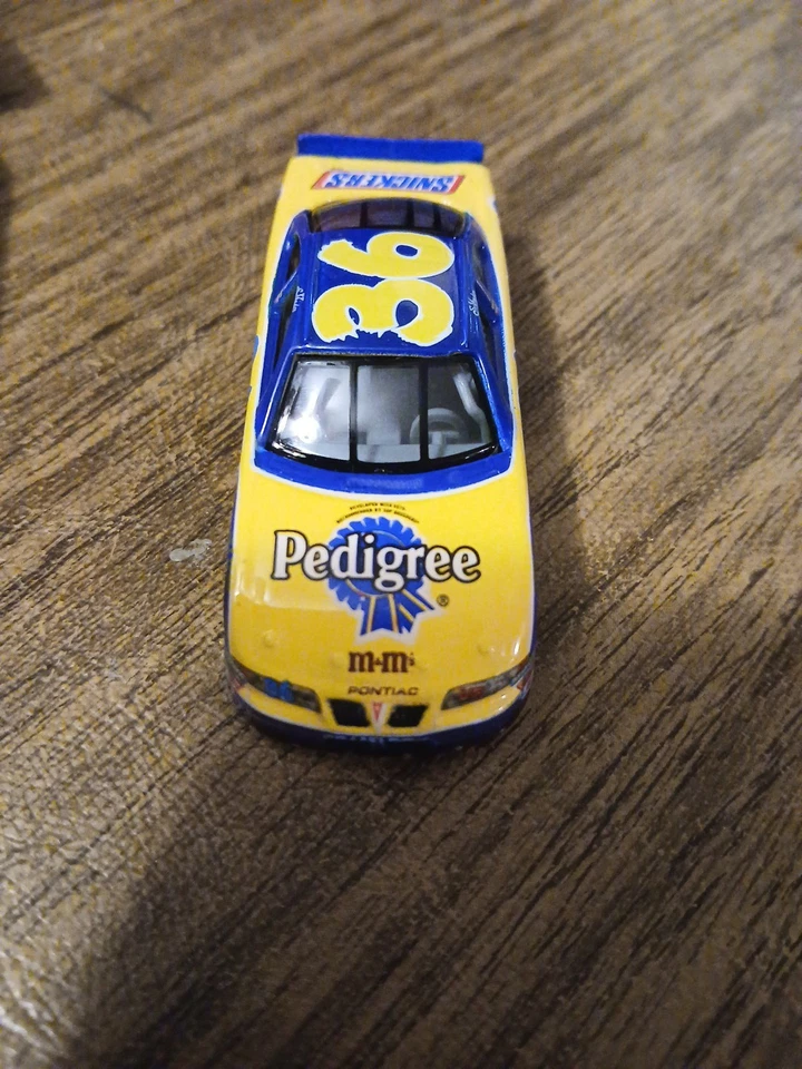 NASCAR 2009 1:60 Ernie Irvan #36 Pedigree Snickers M&M Die-Cast Foto 2 de 4