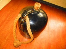 Antique dark brown drip glazed lg whiskey sto...