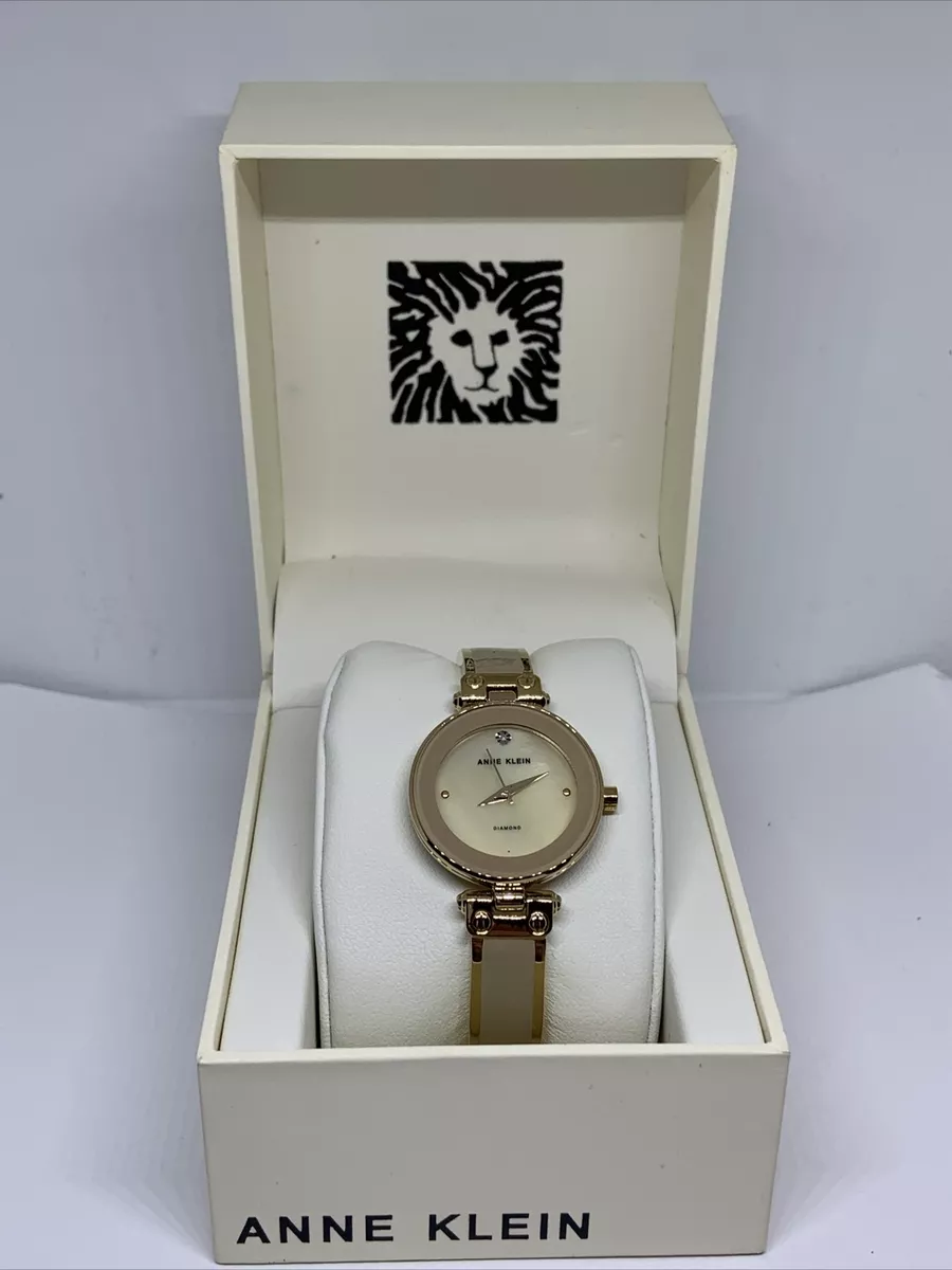 Anne Klein AK 1980TMGB Women Gold Stainless Steel Analog Dial Quartz Watch BL307