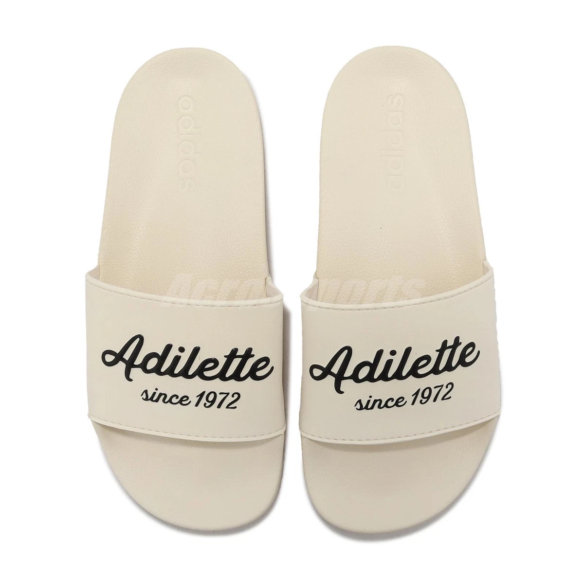 Sandalias informales Adidas Adilette Shower Wonder blancas negras para hombre unisex GZ9510