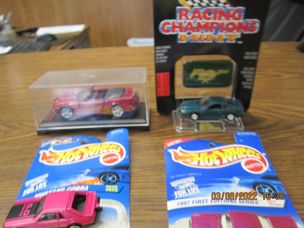 4 Different Collector Models from Hot Wheels, Racing Champions, and Maisto