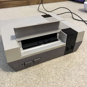 Authentic Nintendo (NES) Lot Of 18 Games, 2 Consoles, 4 Controllers And More