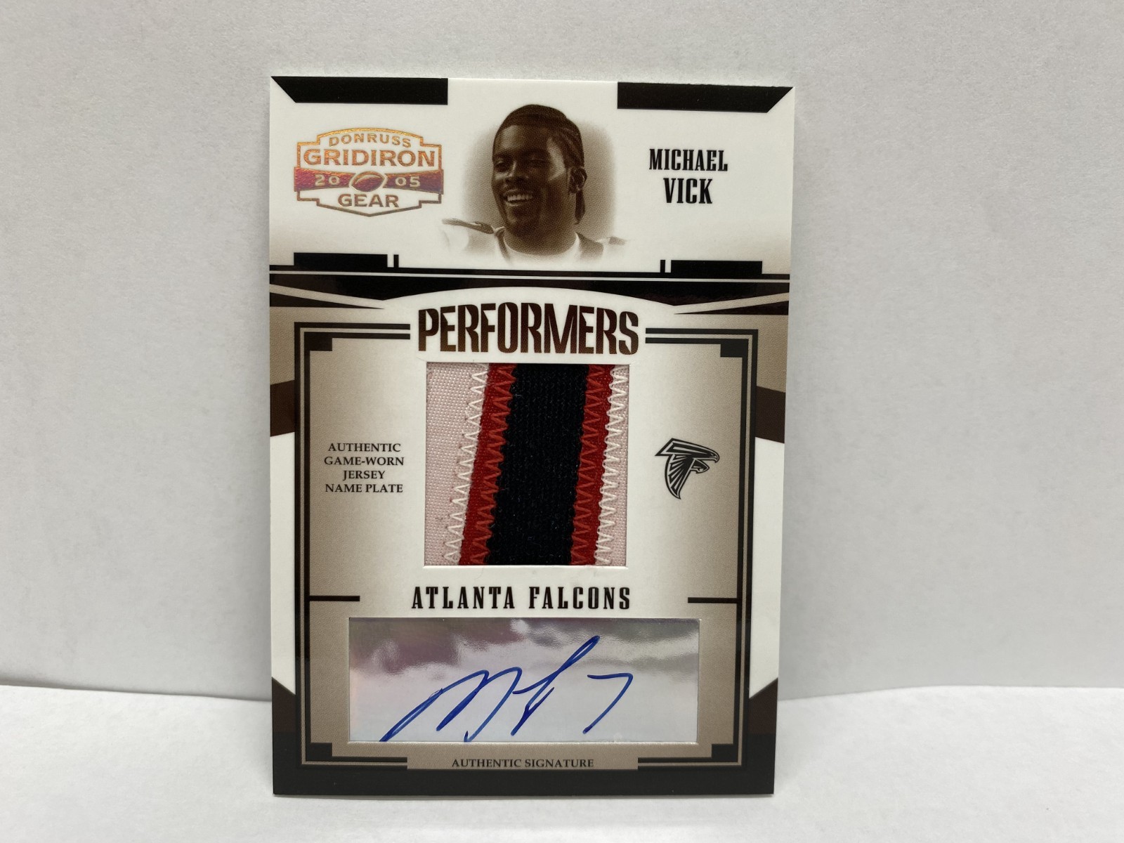 2005 Donrus Gridiron Gear Michael Vick Game Worn Name Plate & Auto 1/5