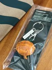 STARBUCKS PUMPKIN KEYCHAIN REUSABLE HOT CUP LID STOPPER-NWT!