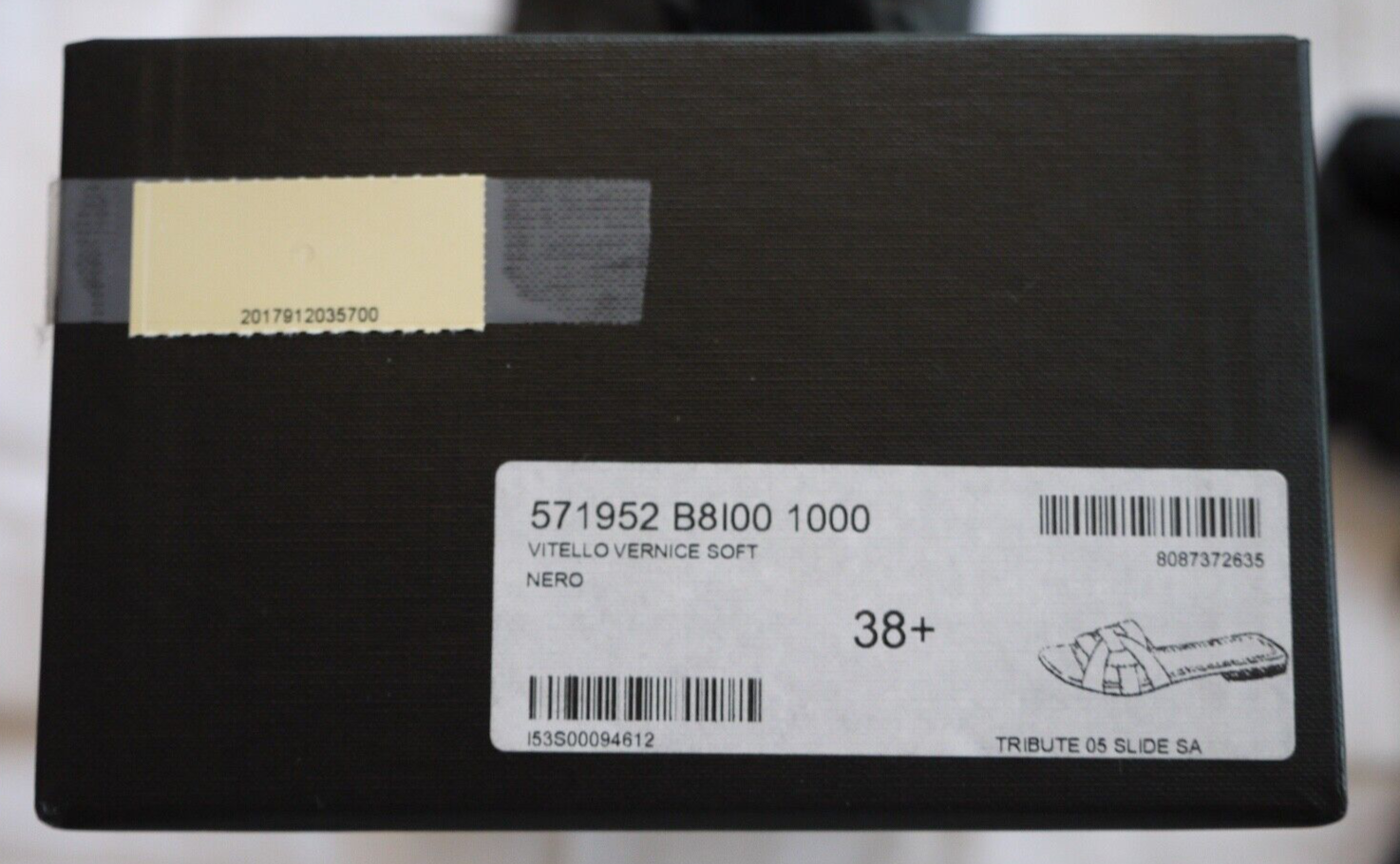 Diapositive brevetto tributo Saint Laurent