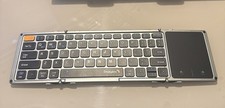silver ProtoArc XK02 foldable Bluetooth keyboard with a built-in touchpad Silver