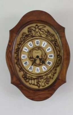 horloge murale vintage en bois massif - Photo 1/4