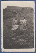 Beautiful guy with girls on the grass in nature Soviet Vintage Photo USSR