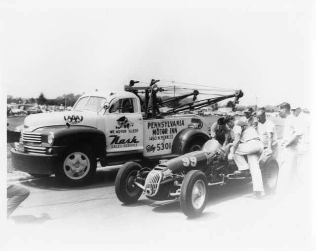 1949 Nash Wrecker Tow Truck Next to 1951 Belanger Motors Special Photo 0021 - Image 1 of 1
