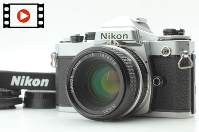 Cla'd [N NEUWERTIG] Nikon FE silber mit Nikkor Ai analoge...