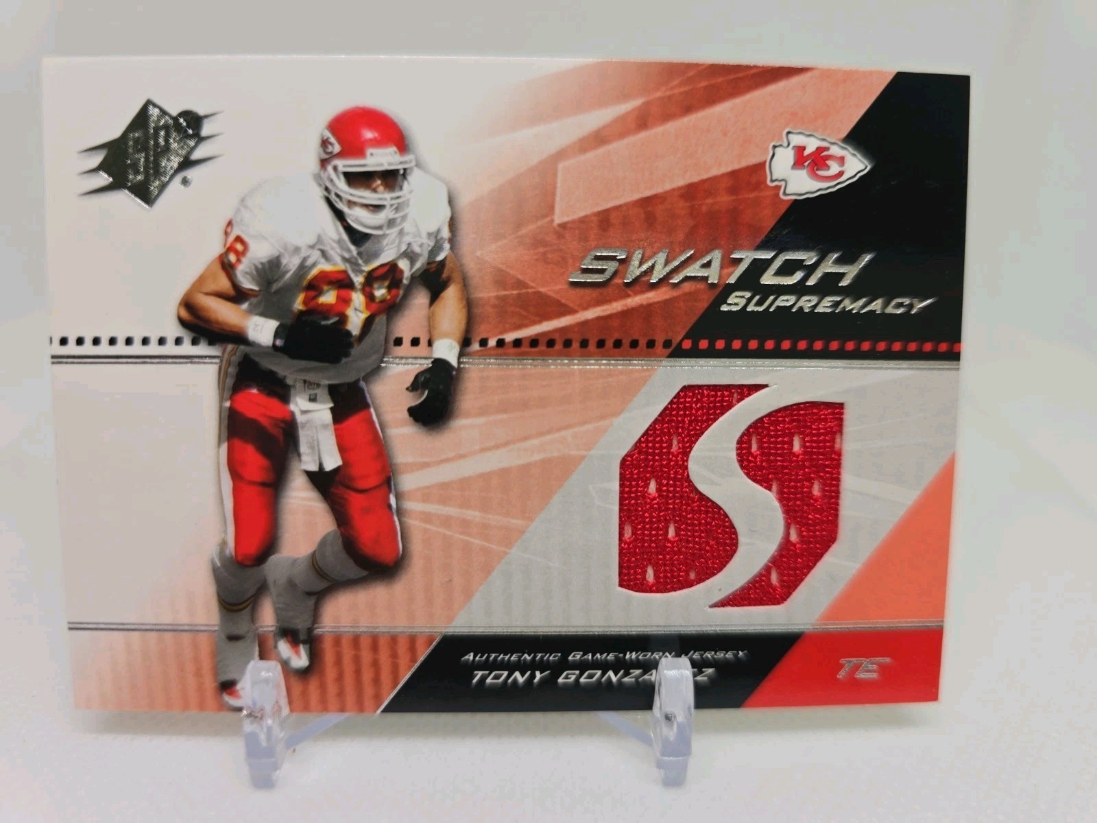 2004 SPx Swatch Supremacy #SW-TG Tony Gonzalez Jersey Insert Card - Game Used