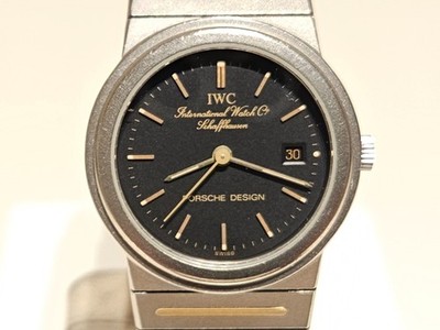 VINTAGE SWISS 26mm TITANIUM AND 18K GOLD QUARTZ LADIES WATCH