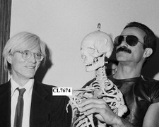 Andy Warhol with Venezuelan Artist Victor Hugo Holding a Human Skeleton Photo