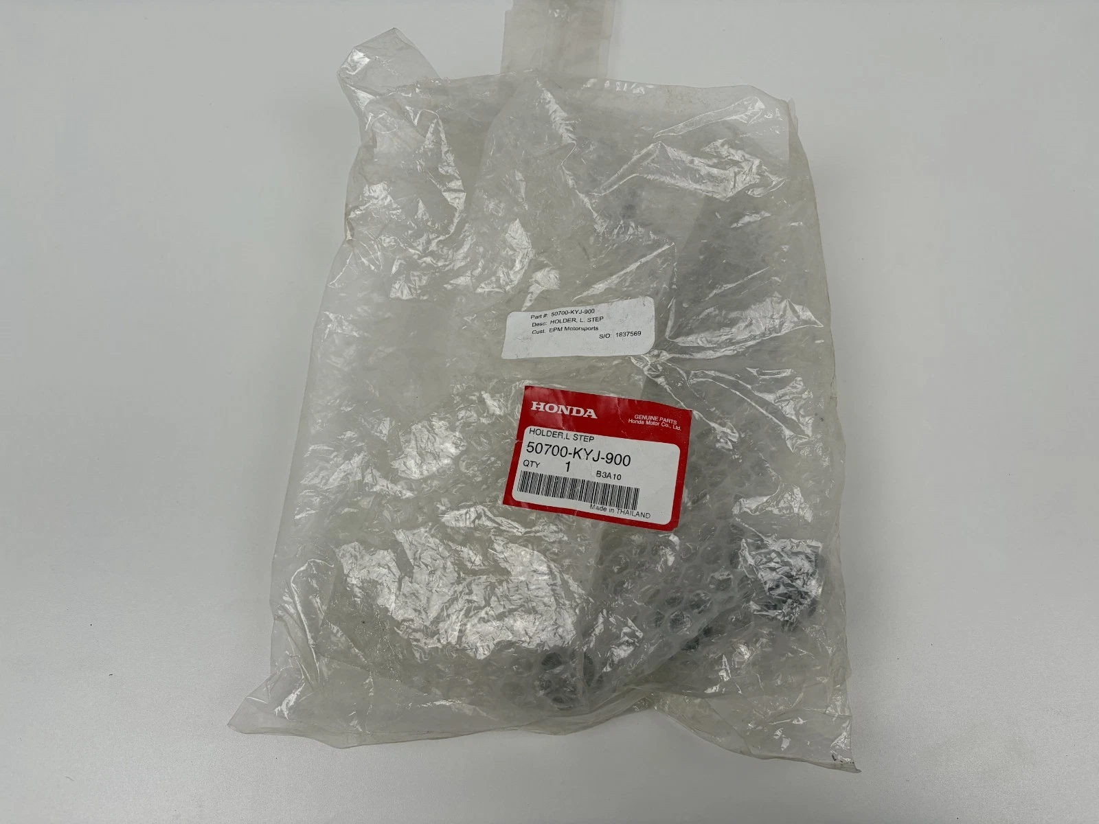 50700-KYJ-900 | Honda | OEM Step Holder / Foot peg Bracket