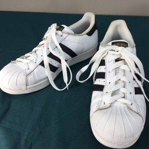 adidas white tennis shoes with black stripes
