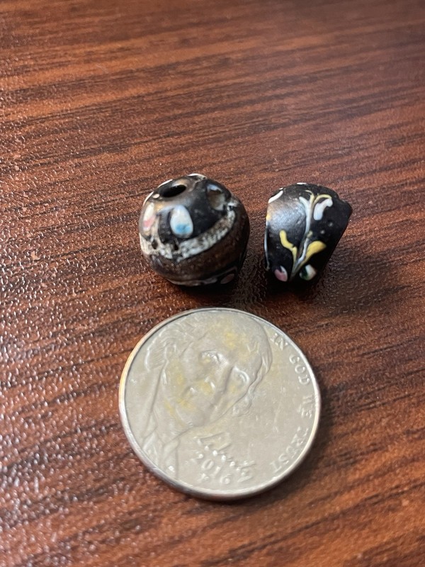 Antique Venetian Black Glass Decorated Beads