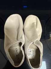 So Danca Jazz shoe,  the M0618 model, in a tan or caramel color.  Size 51/2 M