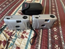 Vintage Bell  Howell 35mm Film Camera Focus Free 28mm Lens . Have two cameras