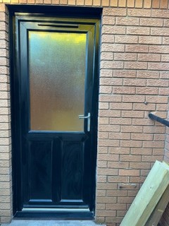 Painted Black UPVC Door with Glass Window.