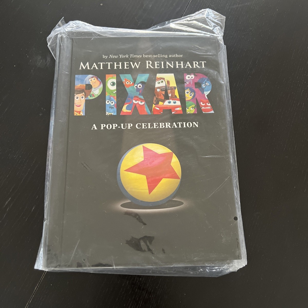 Disney*Pixar : A Pop-Up Celebration by Matthew Reinhart (2017