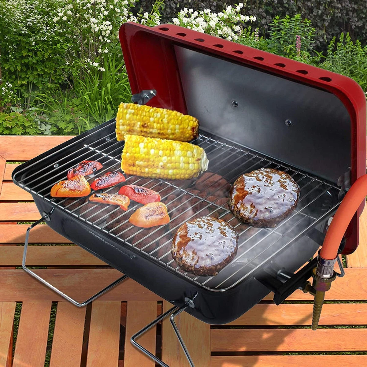 Gas barbecue top with lava rocks