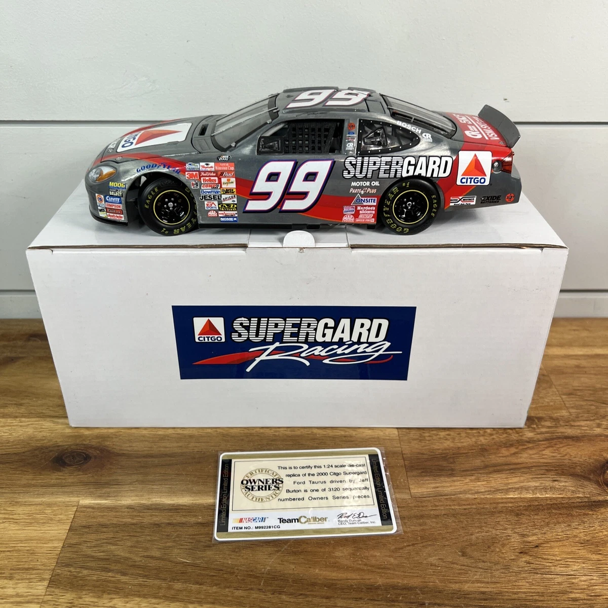 Miniature Team Caliber 1/24 - Ford Taurus #99 Exide - 2000 - Diecast