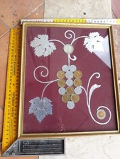 Quadro raffigurante un uva   con monete antiche 500 argento
