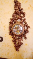 Orologio d'epoca da parete stile barocco colore oro  con meccanismo originale