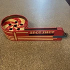 VINTAGE  TIN WOLVERINE SUPPLY PITTSBURGH PA SPOT SHOT TOY