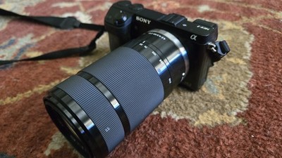 Sony Alpha NEX-7 24.3 MP Mirrorless Digital Camera with Batteries & Three Lenses