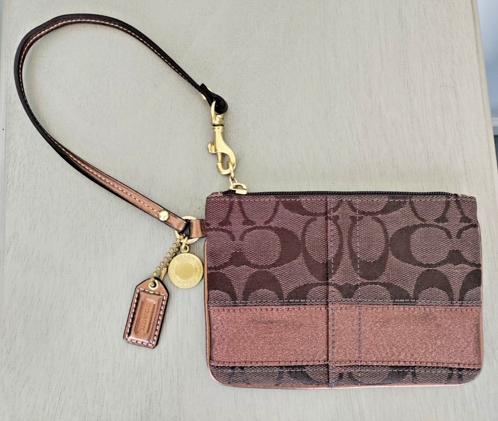 COACH Corner Zip Wristlet Signature Brown and Brass Color Pouch