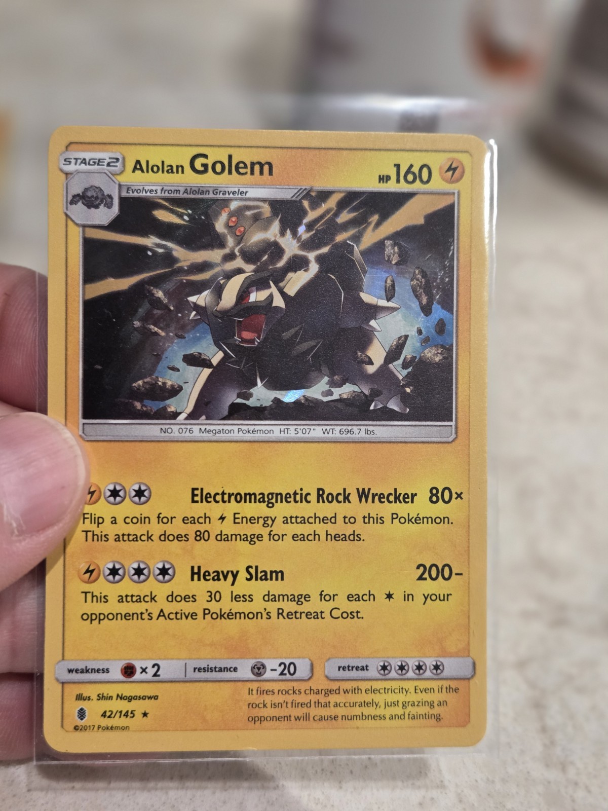 Alolan Golem - 42/145 - Guardians Rising - Holo