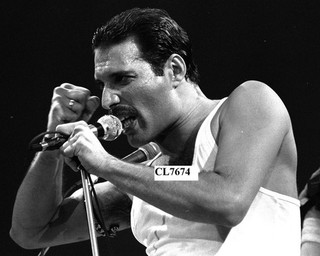 Freddie Mercury of the Rock Band Queen Performs at Live Aid at Wembley Stadium