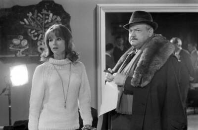 Orson Welles and Italian actress Elsa Martinelli taking a break on- Old Photo